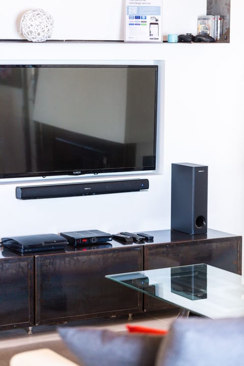 Entertainment system with 50" satellite HDTV and Playstation 3