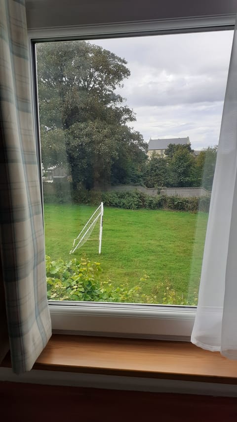 View over neighbours field from bunk bed room.