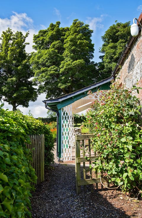 Garden gate leading to the veranda
