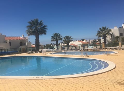 Outdoor pool, a heated pool, sun loungers