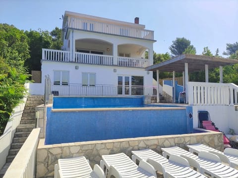 Villa showing all 3 Floors, pool and terraces