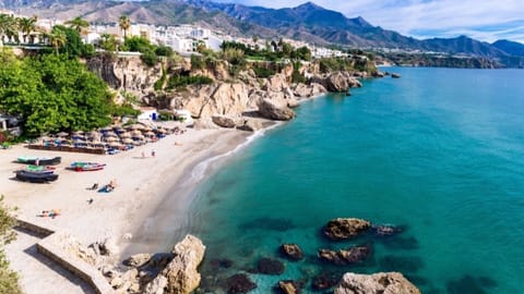 On the beach, sun loungers