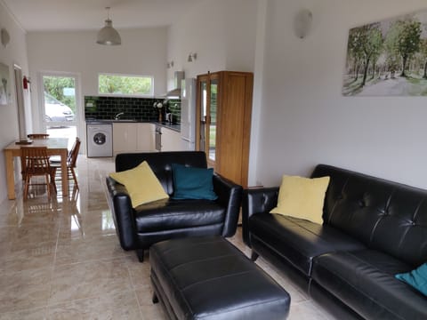 Comfortable 4 seater sofa and "cuddle chair".