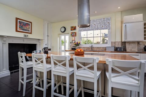 Kitchen has dbleoven, electric hob, dishwasher, 2 fridges, freezer, washer/dryer