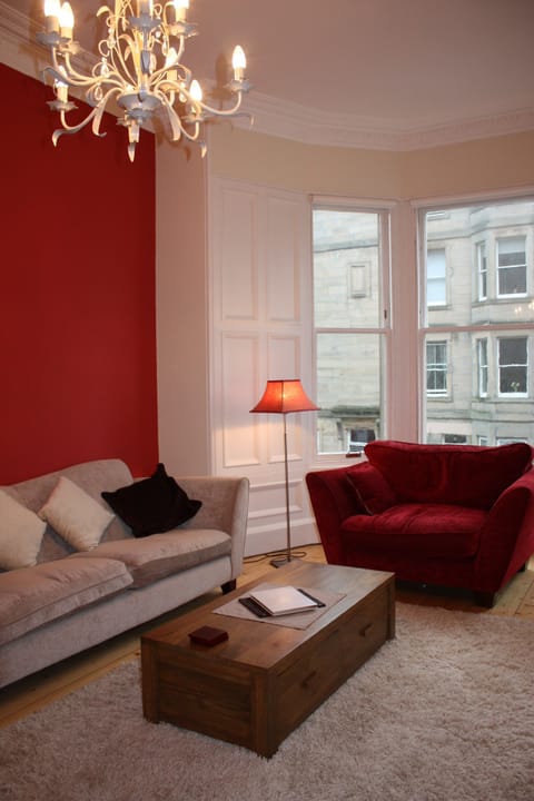 extremely comfertable sitting room with open fire