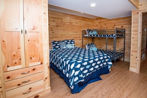 Another view of one of the 2 BR-BA suites w/ Queen bed, + Full & Twin Bunkbeds.