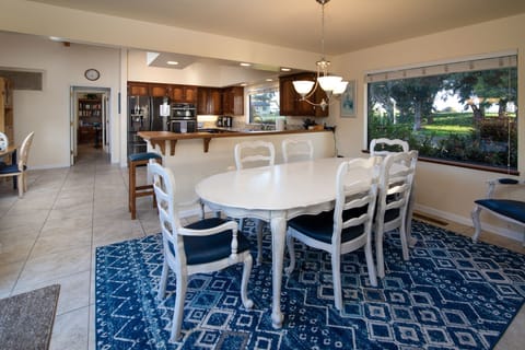 The dining table seats up to 8 people and the breakfast nook seats 4.