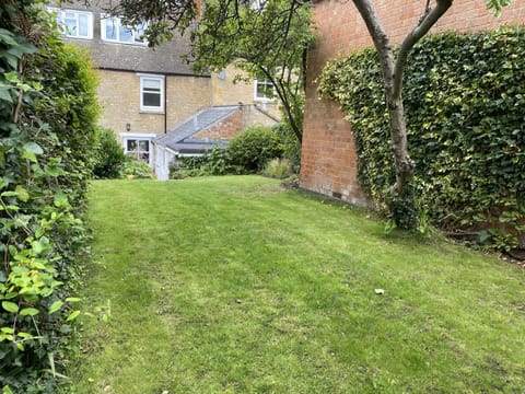 The back lawn, looking  towards the rear of the house - you can't see the patio.