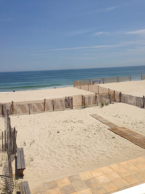 On the beach, sun loungers, beach towels