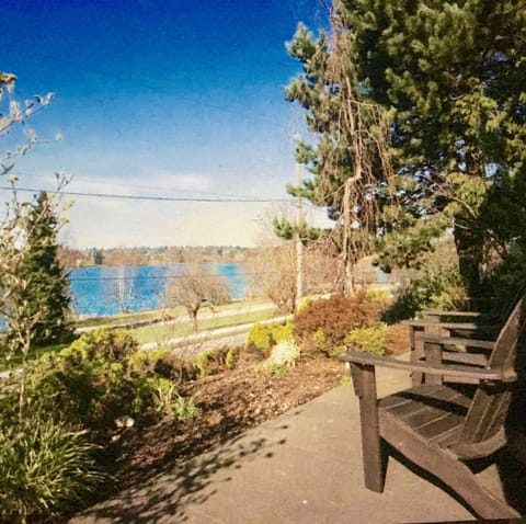 View of the lake from your private patio, perched above East Green Lake Way 