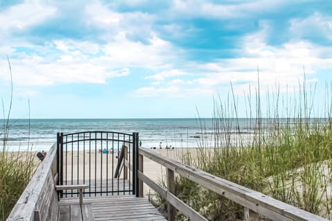 On the beach, sun loungers, beach towels