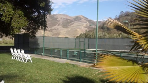 We have rackets and balls for your use, but please bring shoes with non-marking 