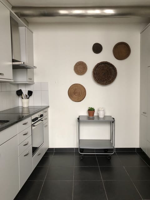 Fully equipped eat-in kitchen. We provide coffee, spices, olive oil and more!