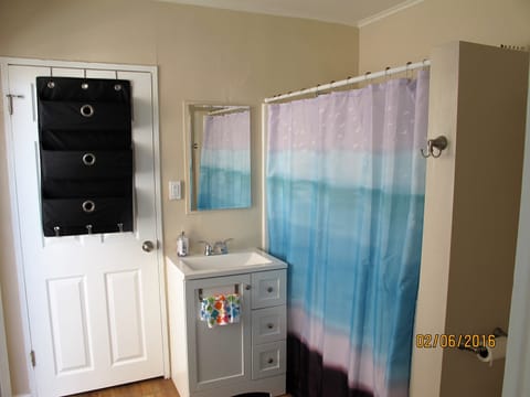 Combined shower/tub, hair dryer, towels, soap