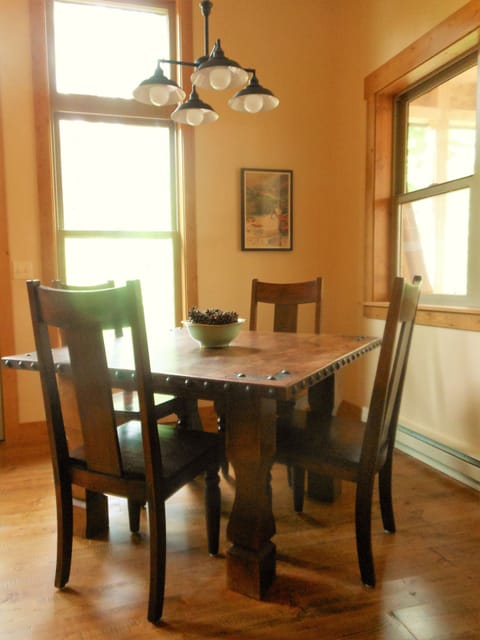 Beautiful custom wood table to enjoy indoor dining and games.