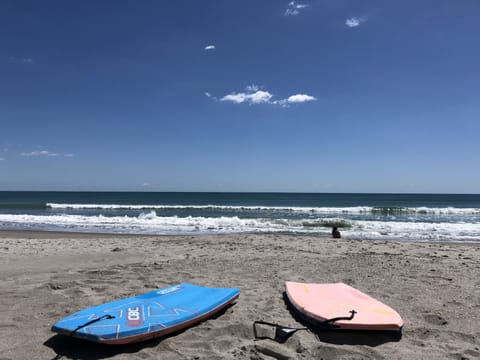 On the beach, sun loungers, beach towels