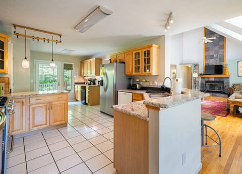 Huge well-stocked kitchen w/5-burner stove, 2 ovens, 2 fridges and big counters.