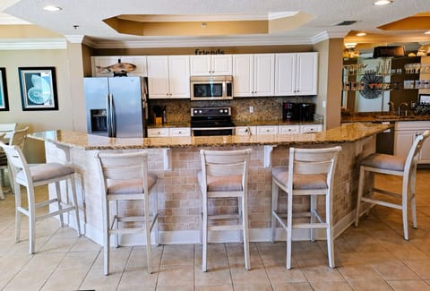 Kitchen island with seating for 5.