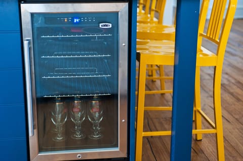 Beverage fridge for wine or to chill beer glasses.