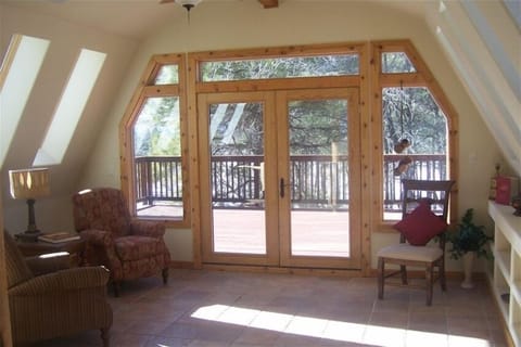 Main House Reading Room & Deck. Relax & read a book or enjoy the views