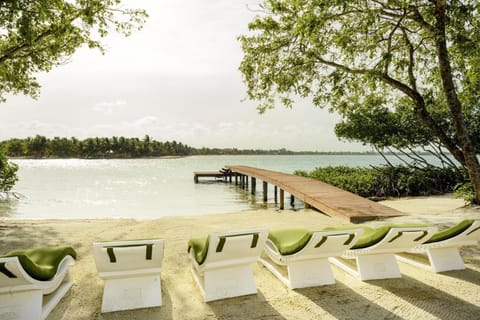 On the beach, sun loungers, beach towels