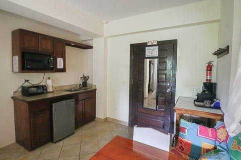 Inside Garden Suite master bedroom showing cooking facilities- small kitchenette
