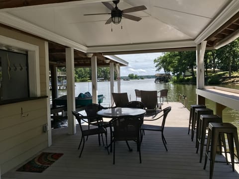 The boathouse has been redesigned with a new bar area, mini fridge, new lighting