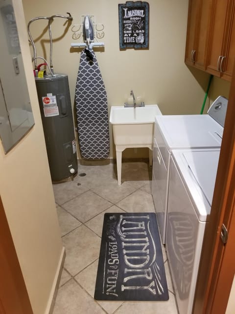 Combined shower/tub, hair dryer, towels, soap