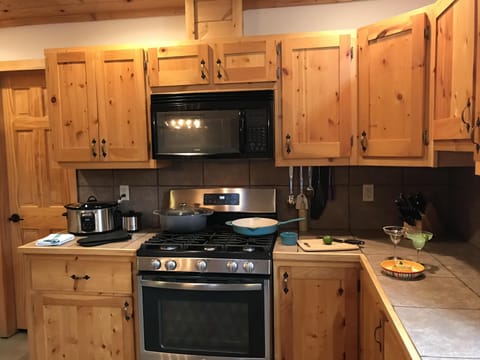 Large, open kitchen with gas range, dishwasher, fully equipped. Just add food!