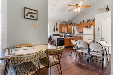 Whip up delicious meals and enjoy family gatherings!  Our vacation rental features a spacious and fully equipped kitchen with ample dining space, ready for all your culinary adventures