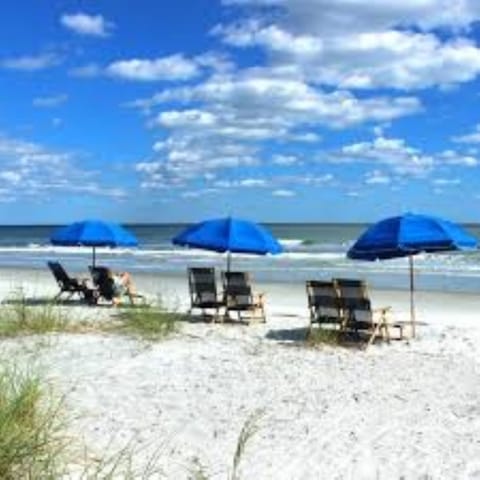 On the beach, sun loungers