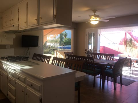 Kitchen Fun to Work Together with Low Bar Seating for 6 and Table for 8 - 10