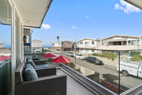 Enjoy ocean views and ocean breezes on the front balcony any time of the year. Separate rear upstairs 2 bd/1 bath unit can also be booked, when available. See separate listing.