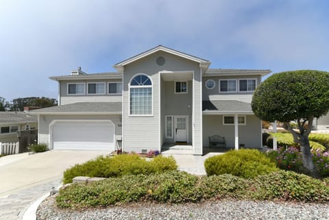 Come enjoy this beautifully remodeled 2-story home with great views, large decks, open living space.