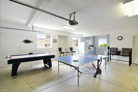 This home has a ping pong table and extra fridge. Air Hockey no longer available