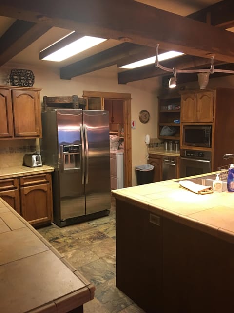 large side by side refrigerator in large kitchen
