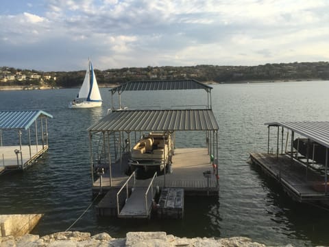 Outstanding view of Lake Travis and private boat dock (24X36) with upper deck.