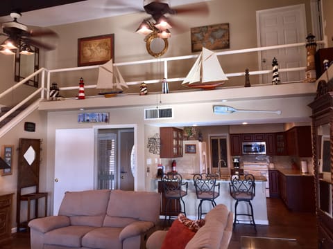 Large living room showing kitchen and open floor plan.