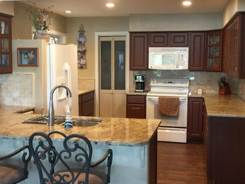 The kitchen has been renovated with granite counter tops and new cabinets.
