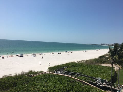 On the beach, sun loungers, beach towels