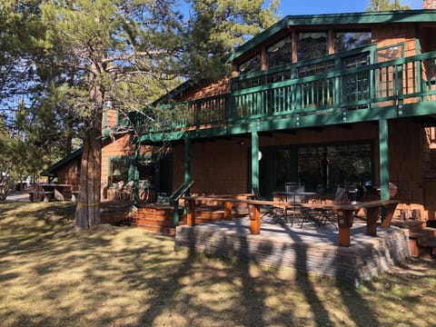 The front lawn is a great place to hang out -- lake view through the trees!