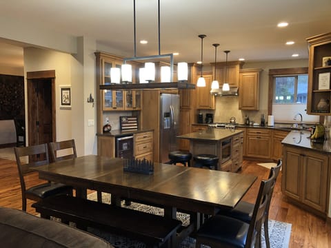 Kitchen table expands to seat 14.