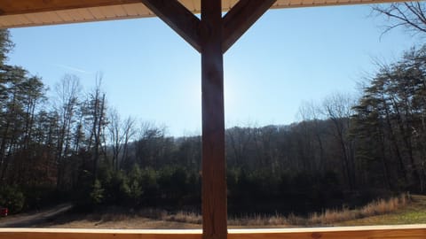 View from sunny front porch, overlooking mountain