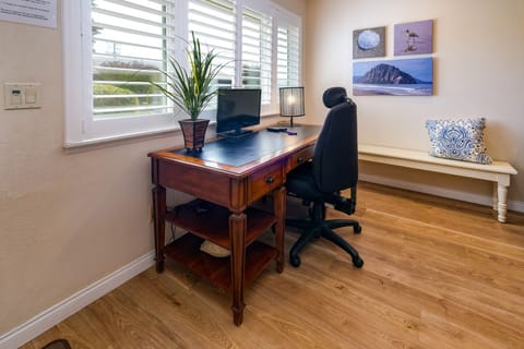 Large desk in the living room that you can use as a work space