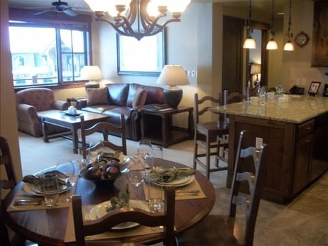 Dining area to kitchen and living room (deck outside living room)