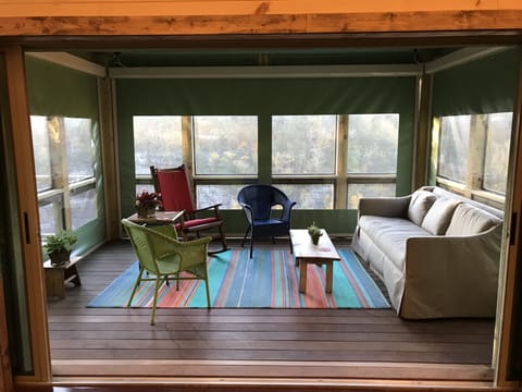 Screen porch inside overlooking falls & canyon