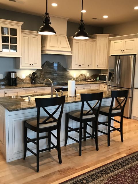 Mountain scene granite backsplash