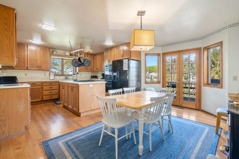 A second dining table in the kitchen.