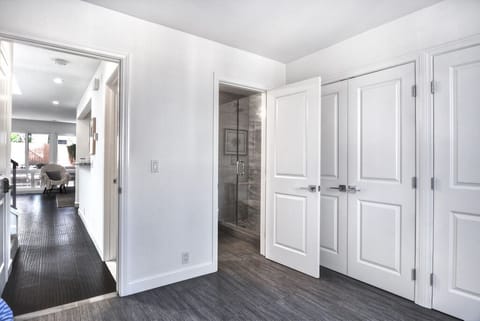 Downstairs guest bedroom entrance to its own bathroom