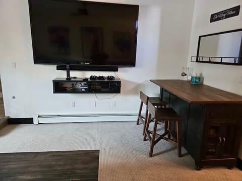 80" Smart TV with Cable and bar area on Lower Level Media Room